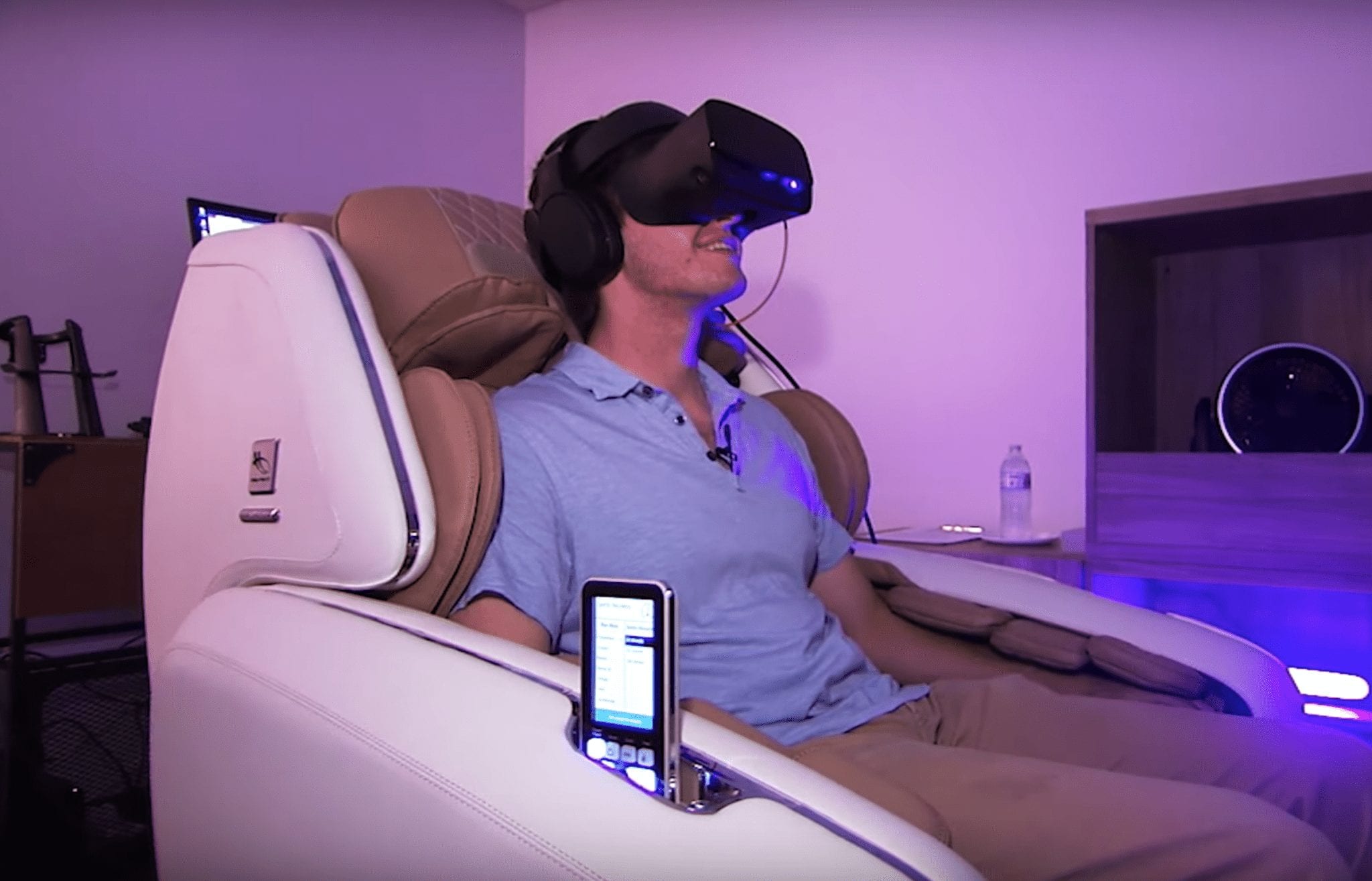 man experiencing a vr massage while sitting on a massage chair