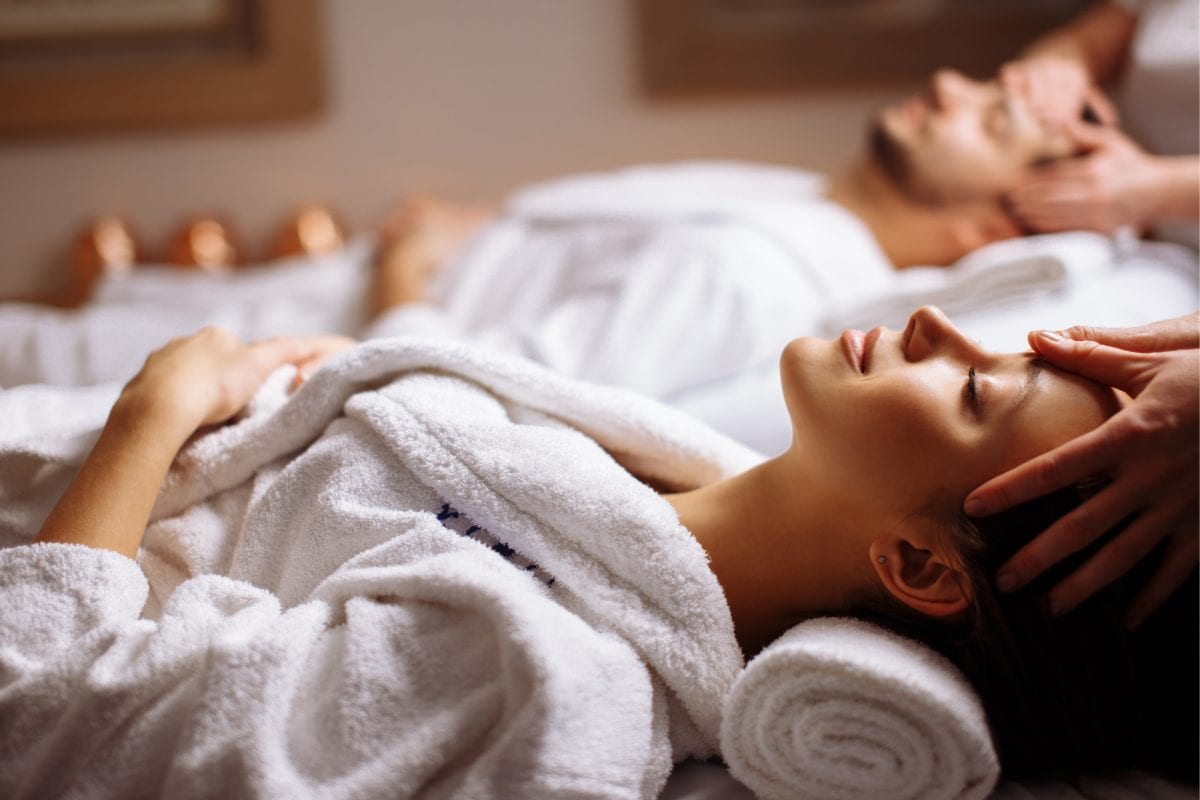 couple enjoying a massage at a spa