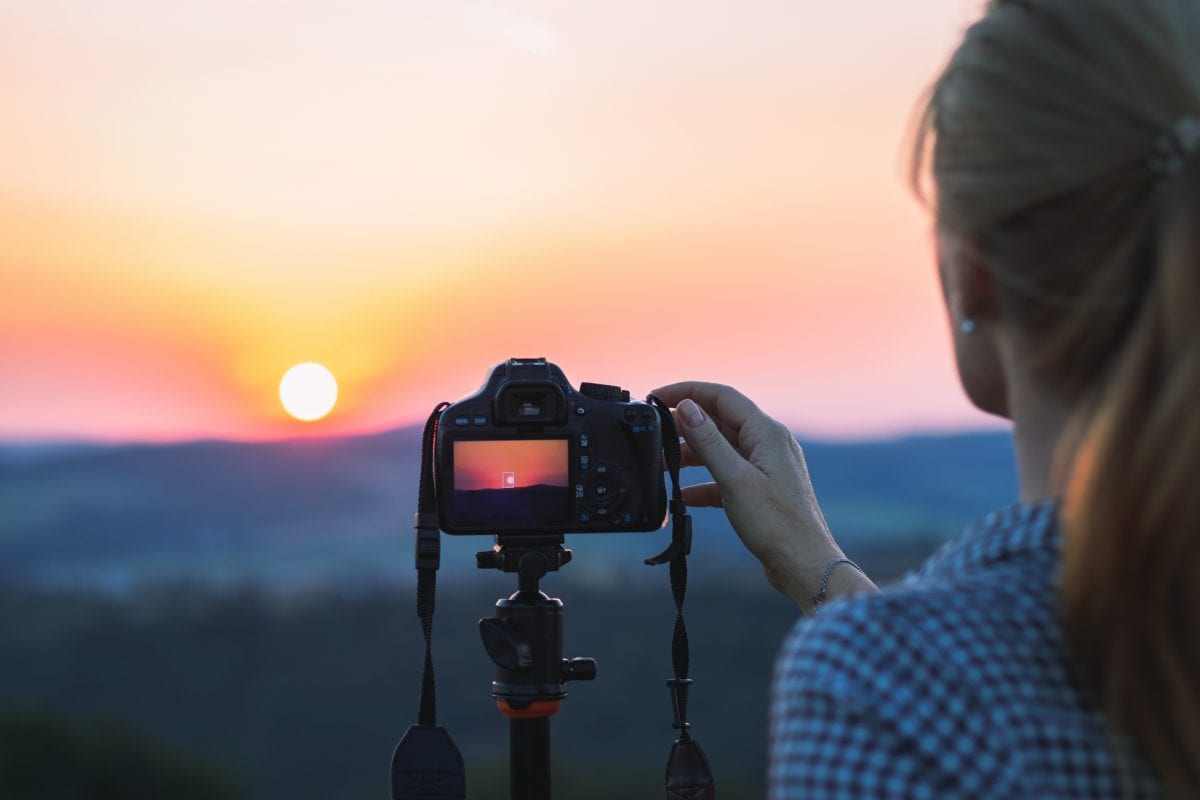 a lady deciding the place that she want to take 360 image